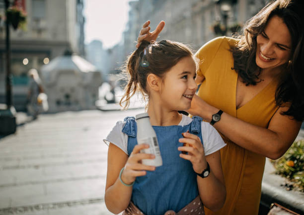 istock Mother daughter eating outdoor 1201668805