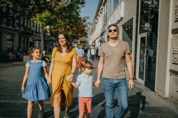 istock Family takes a break from sightseeing 1201668982