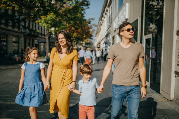 istock Family takes a break from sightseeing 1201669006