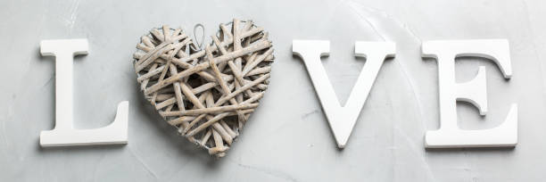 istock Valentines day holiday text word love with heart 1201669238