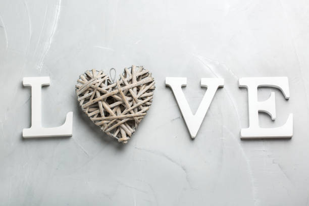 istock Valentines day holiday text word love with heart 1201669252