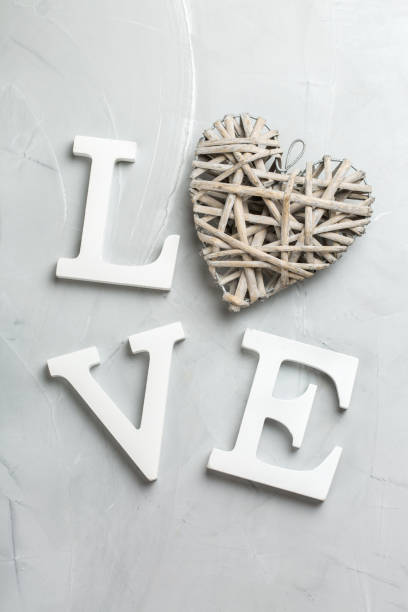 istock Valentines day holiday text word love with heart 1201669264