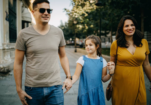 istock Family takes a break from sightseeing 1201669282