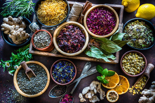 istock Various multi colored dried tea leaves and flowers shot from above 1201672803