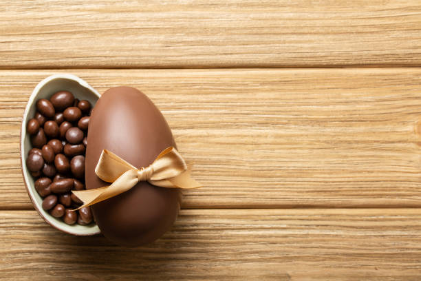 istock easter chocolate eggs with colorful candies 1201674716