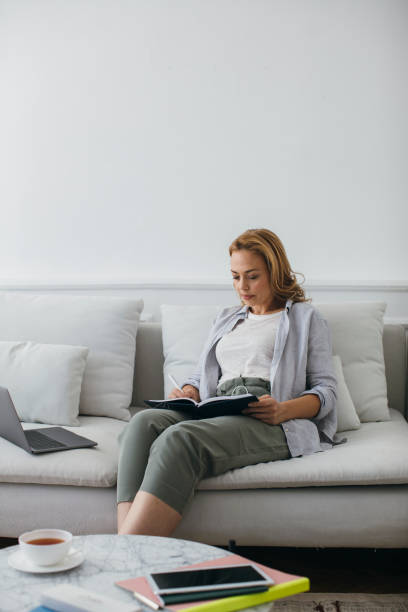 istock A Woman freelancer Working at Home 1201683823