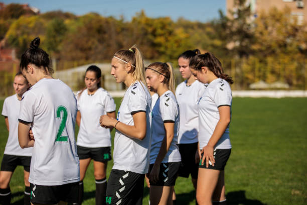 istock Woman soccer team after training on training grounds 1201684356
