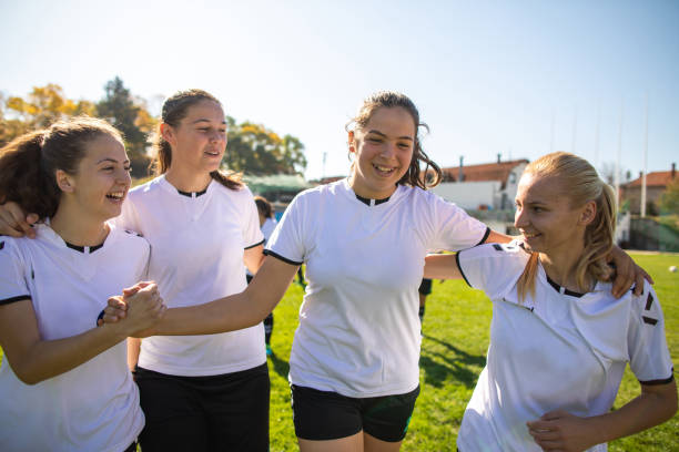 istock Happy female soccer team celebrating victory 1201685553