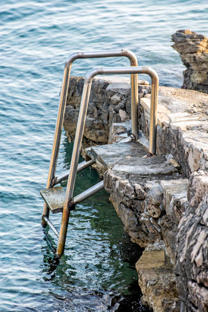 istock Metallic ladder on the beach, Solta, Croatia 1201686036