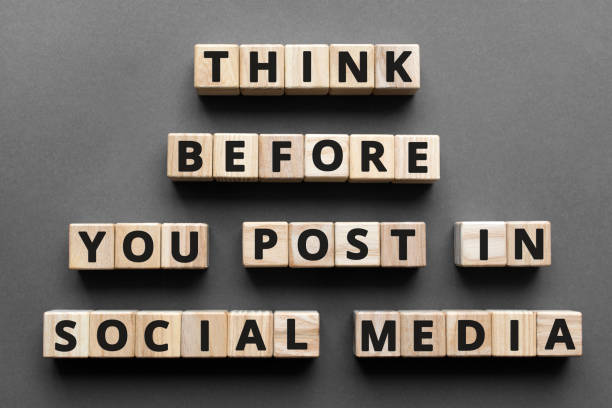 Think before you post in social media - words from wooden blocks with letters Think before you post in social media - words from wooden blocks with letters, social media activism concept, top view gray background cyberbullying stock pictures, royalty-free photos & images