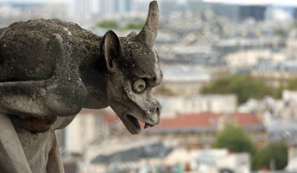 istock gargoyle on the cathedral of Notre Dame in Paris while observing 1201688585