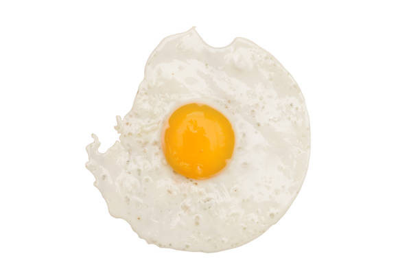 istock Fried egg. Top view fried eggs with yellow yolk on a white background. Food for the morning breakfast. 1201689819