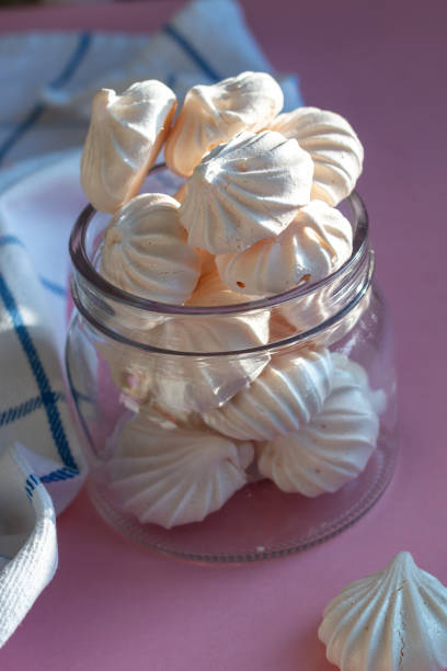 istock White delicious merengue in a glass jar 1201689918
