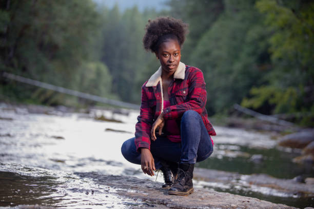 istock Beautiful Young Woman Enjoying Nature 1201690603