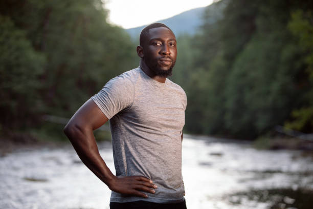 istock Man Enjoying the Outdoors in a Beautiful Setting 1201690611