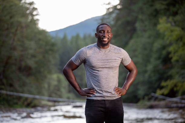 istock Man Enjoying the Outdoors in a Beautiful Setting 1201690623
