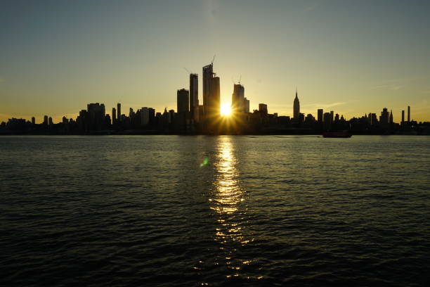 istock Manhattan skyline hiding the sunrise 1201695110