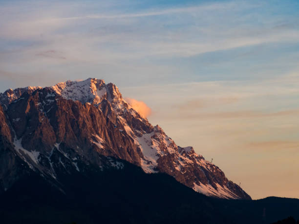 istock Summit Zugspitze at twilight, Wetterstein mountain range, Bavarian Alps, Germany 1201704968