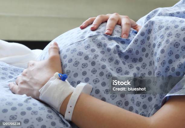 Newborn Baby And Pregnancy Stock Photo - Download Image Now - Pregnant, Hospital, Women