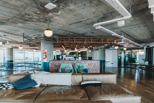 istock A luxury empty coworking studio with a shared bar counter and a relax area 1201710352