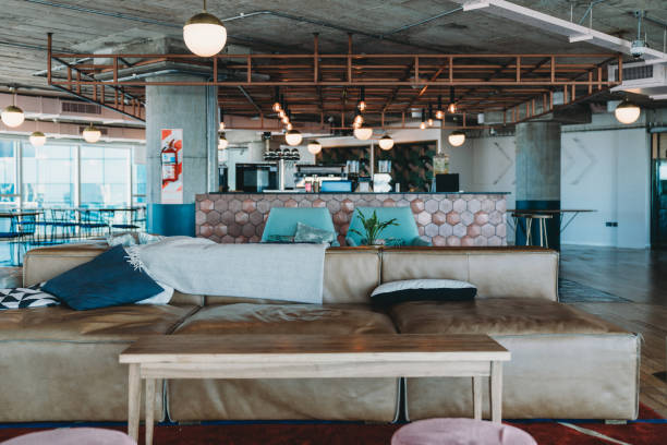 istock A luxury empty coworking studio with a shared bar counter and a relax area 1201710357