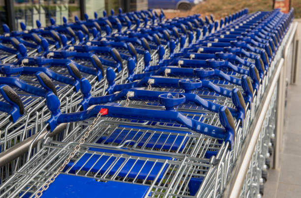 istock shopping carts in a line 1201710451