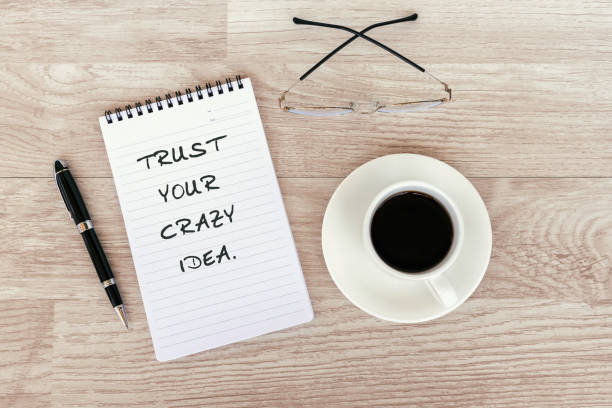 istock Inspirational quotes - Trust your crazy idea 1201714654