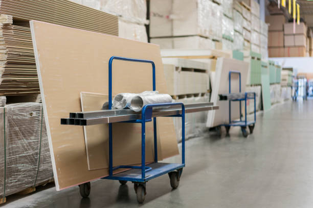 istock Trolley in a hardware store loaded with construction materials. Repair and construction concept 1201715162