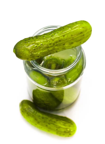 istock canned pickled cucumbers on white 1201715806