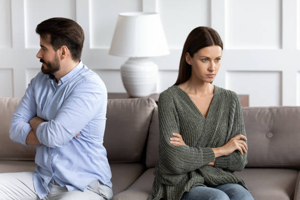 istock Angry husband and wife avoid talking think of breakup 1201716276
