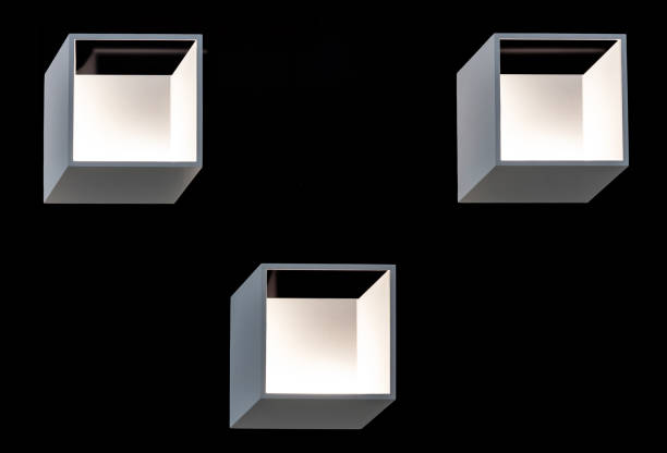 istock Square LED wall lights on a black background. LED lighting in a modern interior. 1201720867