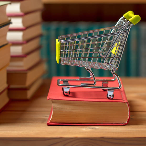 istock Books and a shopping cart 1201722266