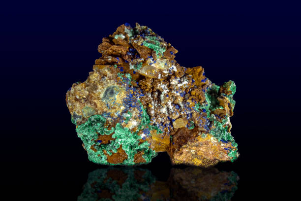 istock Malachite Azurite mineral stone, on dark background 1201722930