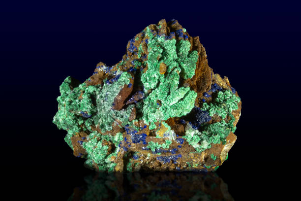 istock Malachite Azurite mineral stone, on dark background 1201722976