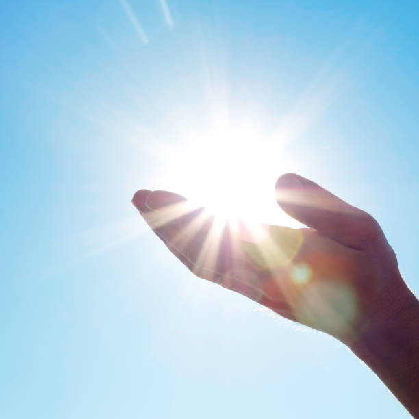 istock Sun in my hand 1201723076