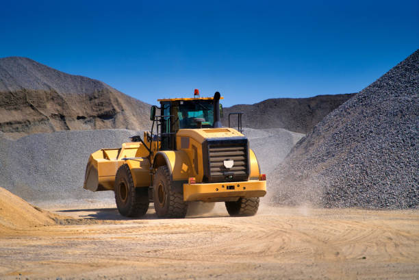 istock Heavy duty machinery working on highway construction site. 1201724351