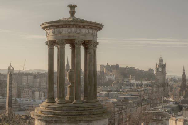 Edinburgh skyline with Edinburgh castle in the background seen from Calton Hill at sunset, Scotland UK