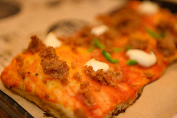 istock Vegan Pizza with Non Dairy Cheese and Meat Substitute Toppings 1201725125