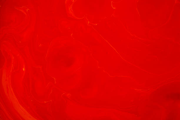 istock Mixed red and white acrylic paints. Abstract background for design. 1201726430