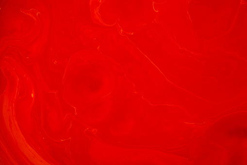 Mixed red and white acrylic paints. Abstract background for design.