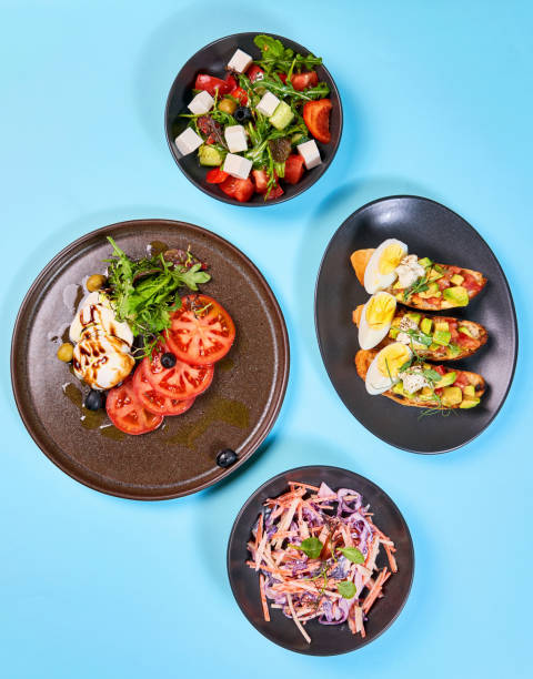 istock delicious fresh salad on the table 1201729527
