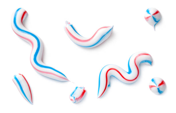 dentifricio isolato su sfondo bianco - toothpaste glue blue white foto e immagini stock