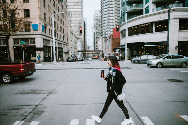 istock Woman in Overcast Downtown Seattle Washington 1201747850