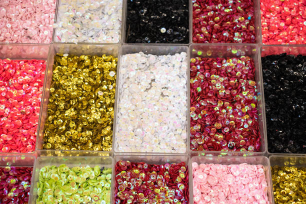 istock Many multi-coloured sequins sold on the local market 1201749140