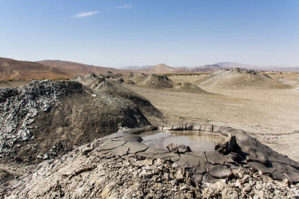 Mud active volcanoes in Azerbaijan. Good for banner, enough space for text. Mud active volcanoes in Azerbaijan. Good for banner, enough space for text. baku national park stock pictures, royalty-free photos & images