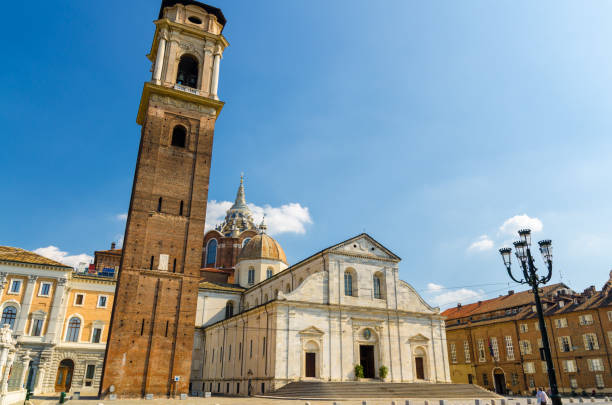 Duomo di Torino San Giovanni Battista catholic cathedral where the Holy Shroud of Turin is rested with bell tower and Sacra Sindone chapel on square in historical centre of Turin city, Piedmont, Italy stock photo