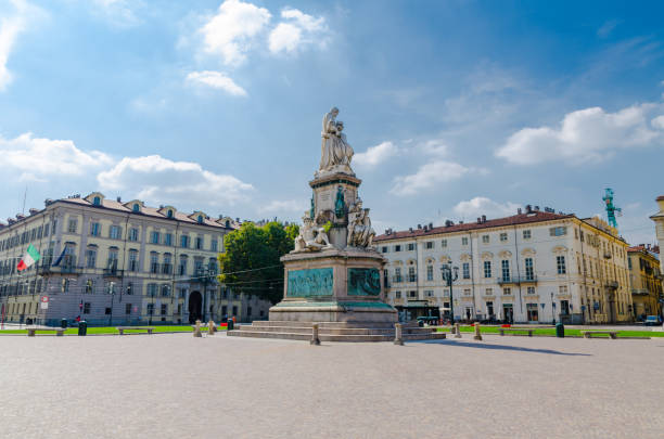 istock Monumento a Camillo Benso conte di Cavour statue on Piazza Carlo Emanuele II square with old buildings around in historical city centre of Turin Torino city in beautiful summer day, Piedmont, Italy 1201756664