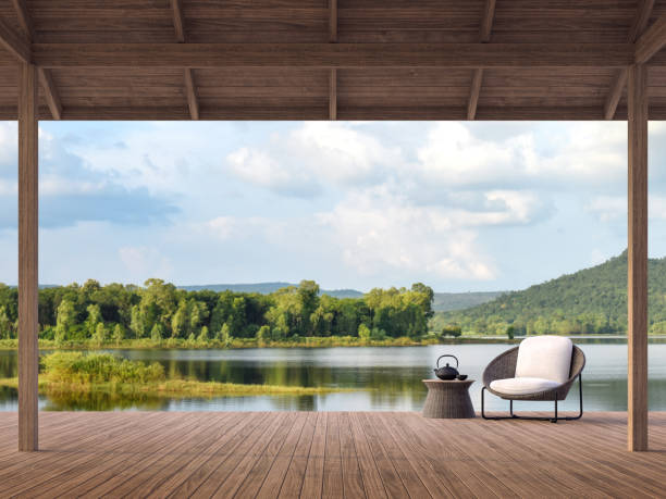 holzterrasse mit schönem see- und bergblick 3d render - aussicht genießen stock-fotos und bilder