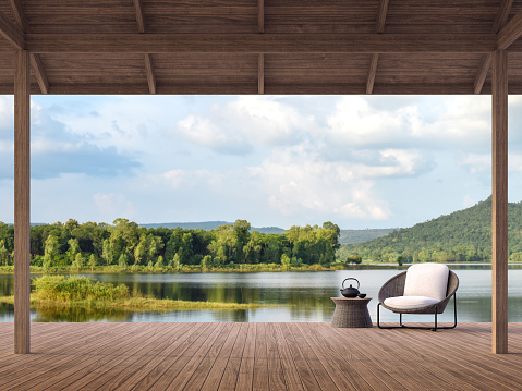 Terraza de madera con hermoso lago y vista a la montaña 3d render photo
