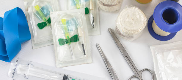 Medical assistance kit for emergencies Kit for quick medical assistance in an emergency, with vials, scissors and tweezers, gauze, compressor, syringe, adhesive tape and disinfectants. gauze stock pictures, royalty-free photos & images